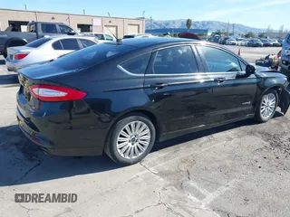 2015 Ford Fusion SE Hybrid with VIN 3FA6P0LU9FR294551, listed as a IAAI auction lot 41545007 with 179,906 mi miles. Bid and sale history available at carsss.com. Image 4.