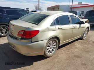 2010 Chrysler Sebring Limited with VIN 1C3CC5FB8AN207416, listed as a IAAI auction lot 41620690 with Not Provided miles and . Bid and sale history available at DreamBid. Image 4.