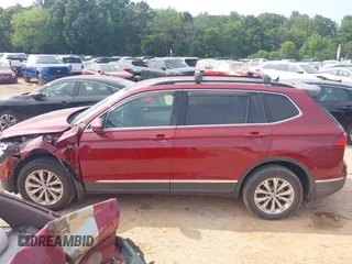 2018 Volkswagen Tiguan SEL with VIN 3VV3B7AX9JM054814, listed as a IAAI auction lot 42394400 with 92,160 mi miles and . Bid and sale history available at DreamBid. Image 14.
