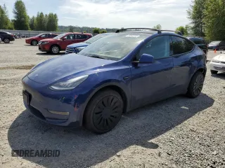 2021 Tesla Model Y Long Range z VIN 5YJYGAEE8MF257424, wystawiony jako Copart lot #60546345 z przebiegiem 35 275 mil mil oraz Szkoda całkowita • Salvage title. Historia ofert i sprzedaży dostępna na DreamBid. Obrazek 1.