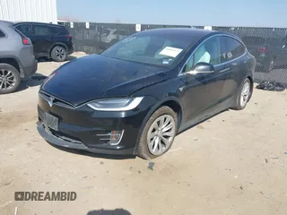 2019 Tesla Model X 75D with VIN 5YJXCBE22KF184504, listed as a IAAI auction lot 41802023 with 137,094 mi miles. Bid and sale history available at carsss.com. Image 2.