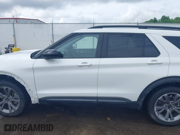 2022 Ford Explorer XLT z VIN 1FMSK7DHXNGB35329, wystawiony jako IAAI lot #42221442 z przebiegiem 56 655 mil mil oraz . Historia ofert i sprzedaży dostępna na DreamBid. Obrazek 14.