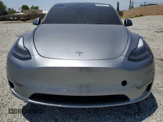 2024 Tesla Model Y Long Range with VIN 7SAYGDEE0RA288420, listed as a Copart auction lot 59159015 with 7,831 mi miles and Salvage title. Bid and sale history available at DreamBid. Image 5.