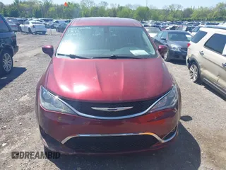2020 Chrysler Pacifica Touring with VIN 2C4RC1FG5LR104163, listed as a IAAI auction lot 42018070 with 188,386 mi miles and . Bid and sale history available at DreamBid. Image 12.