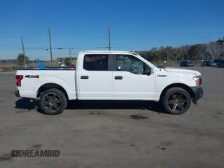 2018 Ford F-150 XL with VIN 1FTEW1EB3JKF67829, listed as a IAAI auction lot 41417816 with 219,899 mi miles and . Bid and sale history available at carsss.com. Image 13.