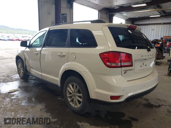 2018 Dodge Journey SXT with VIN 3C4PDDBGXJT469945, listed as a IAAI auction lot 42266310 with 121,871 mi miles and . Bid and sale history available at DreamBid. Image 3.