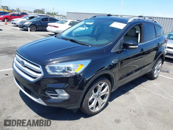 2019 Ford Escape Titanium with VIN 1FMCU9J98KUA21480, listed as a IAAI auction lot 42698275 with 65,478 mi miles and . Bid and sale history available at DreamBid. Image 17.