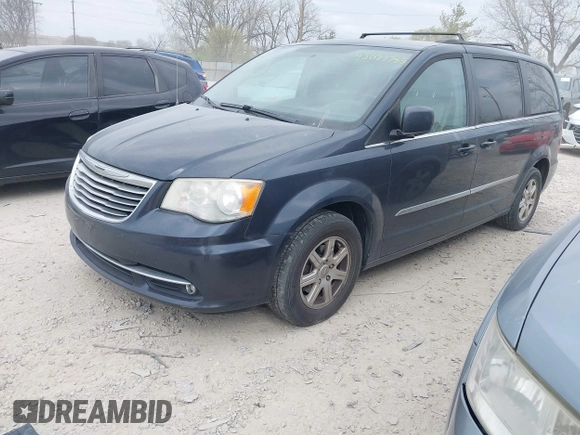 2013 Chrysler Town & Country Touring with VIN 2C4RC1BG4DR595154, listed as a IAAI auction lot 42077785 with 169,474 mi miles. Bid and sale history available at carsss.com. Image 2.