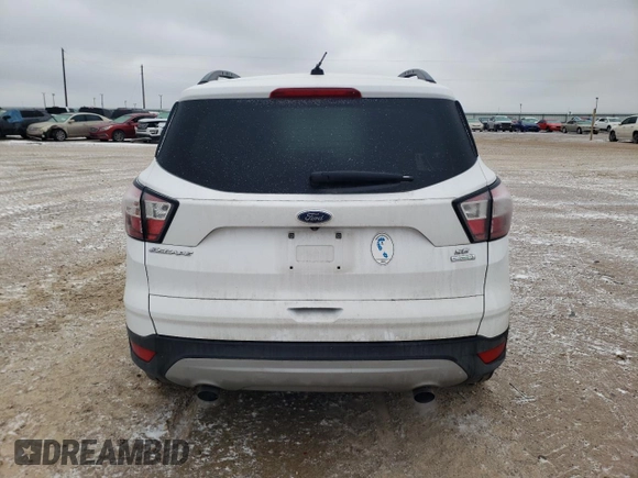 2018 Ford Escape SE with VIN 1FMCU0G99JUB85743, listed as a Copart auction lot 44199235 with 105,025 mi miles and Salvage Title. Bid and sale history available at carsss.com. Image 6.