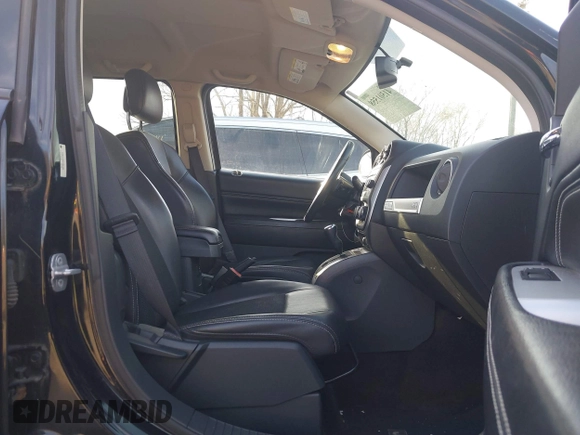 2014 Jeep Compass Latitude with VIN 1C4NJDEBXED661930, listed as a IAAI auction lot 41501558 with 94,133 mi miles and . Bid and sale history available at DreamBid. Image 5.
