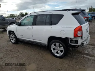2011 Jeep Compass with VIN 1J4NT1FB8BD138161, listed as a Copart auction lot 73679894 with 199,735 mi miles and Salvage Title. Bid and sale history available at carsss.com. Image 2.