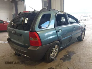 2006 Kia Sportage LX z VIN KNDJF723867179116, wystawiony jako IAAI lot #41964701 z przebiegiem 112 380 mil mil oraz . Historia ofert i sprzedaży dostępna na DreamBid. Obrazek 4.