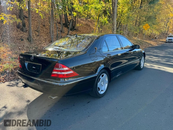 2002 Mercedes-Benz S-Class 6.0L with VIN WDBNG78J02A248557, listed as a Copart auction lot 79517004 with 42,020 mi miles and Clean Title. Bid and sale history available at carsss.com. Image 4.