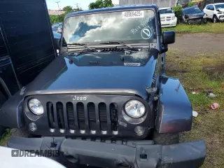 2014 Jeep Wrangler Unlimited Rubicon with VIN 1C4HJWFG7EL302897, listed as a Copart auction lot 48969425 with 57,976 mi miles and Salvage title. Bid and sale history available at DreamBid. Image 5.