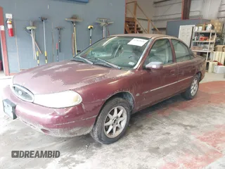 1999 Ford Contour SE z VIN 1FAFP6639XK144984, wystawiony jako IAAI lot #42363538 z przebiegiem 160 891 mil mil oraz . Historia ofert i sprzedaży dostępna na DreamBid. Obrazek 2.