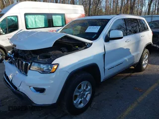 2017 Jeep Grand Cherokee Laredo with VIN 1C4RJFAGXHC756562, listed as a IAAI auction lot 40793476 with 102,241 mi miles and . Bid and sale history available at DreamBid. Image 17.