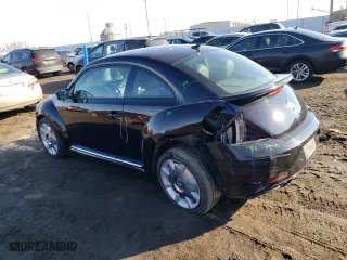 2017 Volkswagen Beetle 1.8T SE with VIN 3VWJ17AT4HM615420, listed as a Copart auction lot 40380154 with 98,746 mi miles and Clean Title. Bid and sale history available at carsss.com. Image 2.
