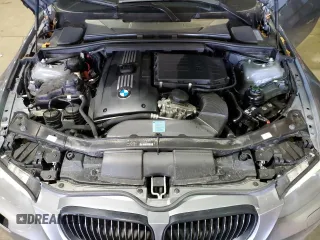 2011 BMW 3 Series 335is with VIN WBAKG1C56BE599457, listed as a Copart auction lot 52412655 with 134,497 mi miles and Clean title. Bid and sale history available at DreamBid. Image 11.