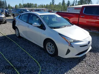 2017 Toyota Prius Two z VIN JTDKARFU1H3033538, wystawiony jako IAAI lot #42362770 z przebiegiem 74 671 mil mil oraz . Historia ofert i sprzedaży dostępna na DreamBid. Obrazek 1.