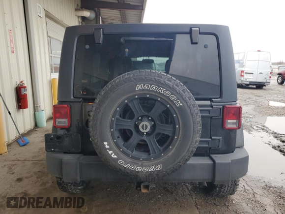 2014 Jeep Wrangler Unlimited Sport with VIN 1C4BJWDG2EL319714, listed as a Copart auction lot 47924575 with 129,294 mi miles and Salvage Title. Bid and sale history available at DreamBid. Image 6.