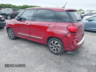 2014 FIAT 500L Lounge with VIN ZFBCFACH1EZ008603, listed as a IAAI auction lot 41583042 with 92,209 mi miles and . Bid and sale history available at DreamBid. Image 3.