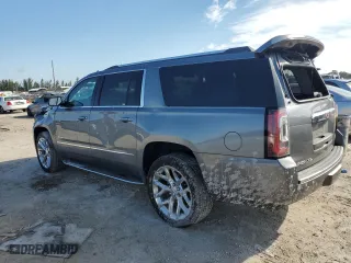 2020 GMC Yukon XL Denali with VIN 1GKS1HKJ8LR293922, listed as a Copart auction lot 76233074 with 67,273 mi miles and Salvage Title. Bid and sale history available at carsss.com. Image 2.