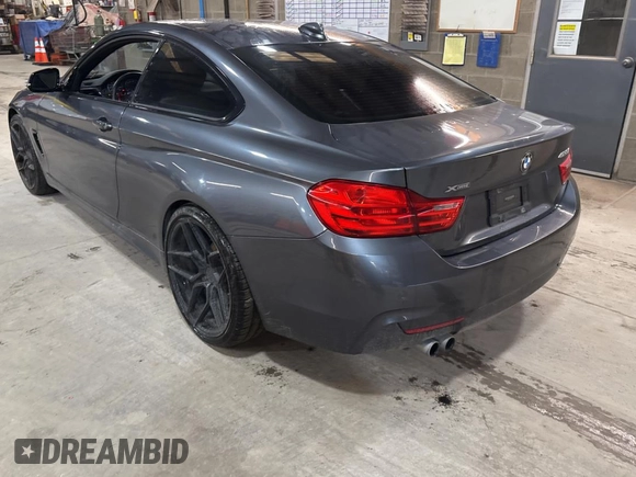 2014 BMW 4 Series 428i xDrive with VIN WBA3N5C56EF716258, listed as a Copart auction lot 52916185 with 106,512 mi miles and Salvage Title. Bid and sale history available at DreamBid. Image 3.