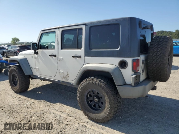 2009 Jeep Wrangler Unlimited Rubicon with VIN 1J8GA69149L767218, listed as a Copart auction lot 59342825 with 157,307 mi miles and Salvage title. Bid and sale history available at DreamBid. Image 2.