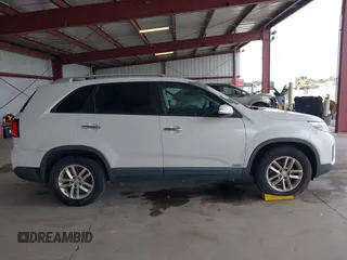 2015 Kia Sorento LX with VIN 5XYKTCA6XFG560437, listed as a IAAI auction lot 42009024 with 191,811 mi miles. Bid and sale history available at carsss.com. Image 13.