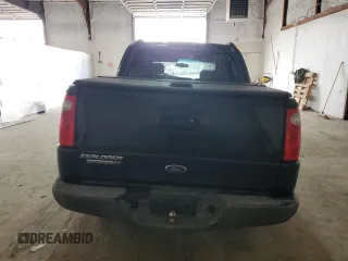 2005 Ford Explorer Sport Trac XLS with VIN 1FMDU77KX5UB63725, listed as a Copart auction lot 49386155 with 165,293 mi miles and Salvage title. Bid and sale history available at DreamBid. Image 6.