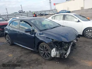 2021 Toyota Corolla Hatchback XSE with VIN JTNA4MBE5M3106405, listed as a IAAI auction lot 41541379 with 96,513 mi miles. Bid and sale history available at carsss.com. Image 1.