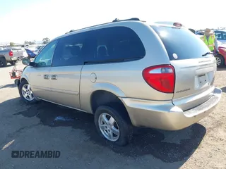 2005 Dodge Caravan SXT with VIN 2D8GP44L05R459369, listed as a IAAI auction lot 42638057 with 76,777 mi miles and . Bid and sale history available at DreamBid. Image 3.