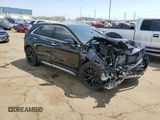 2021 Cadillac XT4 AWD Premium Luxury z VIN 1GYFZDR48MF081095, wystawiony jako Copart lot #54206265 z przebiegiem 60 923 mil mil oraz Tytuł czysty. Historia ofert i sprzedaży dostępna na DreamBid. Obrazek 4.