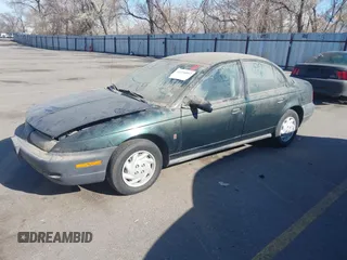 1998 Saturn SL with VIN 1G8ZF5287WZ294842, listed as a IAAI auction lot 41726012 with 170,385 mi miles. Bid and sale history available at carsss.com. Image 2.