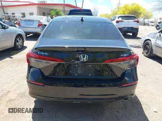 2022 Honda Civic Sport z VIN 2HGFE2F5XNH571381, wystawiony jako IAAI lot #42041589 z przebiegiem 37 667 mil mil oraz . Historia ofert i sprzedaży dostępna na DreamBid. Obrazek 17.