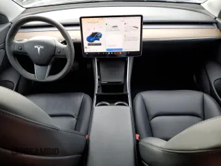 2020 Tesla Model 3 Long Range with VIN 5YJ3E1EB0LF664562, listed as a Copart auction lot 50484355 with 31,884 mi miles and Salvage Title. Bid and sale history available at carsss.com. Image 8.