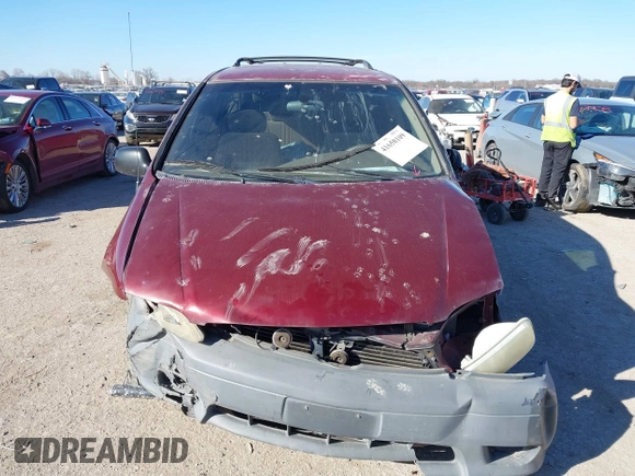 2002 Toyota Sienna CE with VIN 4T3ZF19C52U463405, listed as a IAAI auction lot 41658109 with 138,726 mi miles. Bid and sale history available at carsss.com. Image 12.