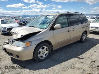 2000 Honda Odyssey EX z VIN 2HKRL1876YH507277, wystawiony jako Copart lot #55753954 z przebiegiem 244 342 mil mil oraz Czysty tytuł • Clean title. Historia ofert i sprzedaży dostępna na DreamBid. Obrazek 1.