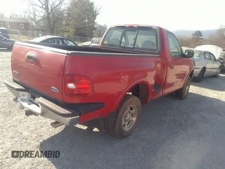 1997 Ford F-150 XL with VIN 1FTDF08W3VKB53525, listed as a IAAI auction lot 41787276 with 165,938 mi miles. Bid and sale history available at carsss.com. Image 4.