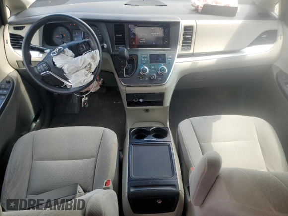 2015 Toyota Sienna LE AAS with VIN 5TDKK3DC8FS582699, listed as a Copart auction lot 56682415 with 195,915 mi miles and Salvage title. Bid and sale history available at DreamBid. Image 8.