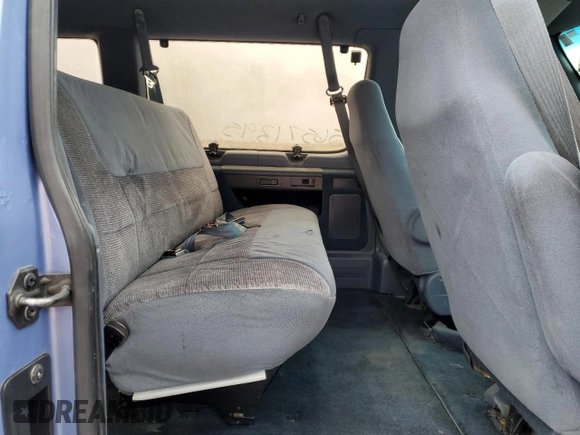 1995 Ford Econoline Cargo z VIN 1FBHE31H4SHA93723, wystawiony jako Copart lot #56571395 z przebiegiem 204 856 mil mil oraz Szkoda całkowita • Salvage title. Historia ofert i sprzedaży dostępna na DreamBid. Obrazek 11.