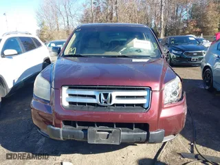 2007 Honda Pilot LX with VIN 2HKYF18167H510970, listed as a IAAI auction lot 40827681 with 119,011 mi miles. Bid and sale history available at carsss.com. Image 12.