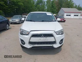 2015 Mitsubishi Outlander ES z VIN 4A4AR3AU8FE057001, wystawiony jako IAAI lot #42433647 z przebiegiem 151 067 mil mil oraz . Historia ofert i sprzedaży dostępna na DreamBid. Obrazek 13.