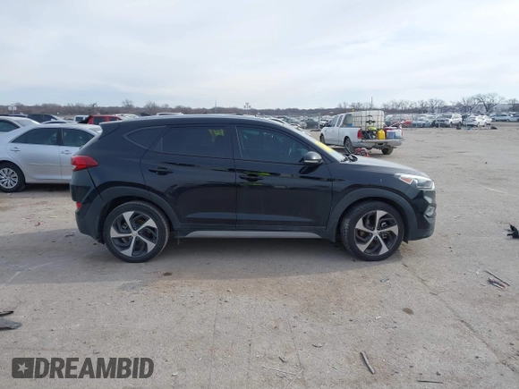 2018 Hyundai Tucson Sport with VIN KM8J33AL7JU772152, listed as a IAAI auction lot 41285203 with 87,188 mi miles. Bid and sale history available at carsss.com. Image 13.