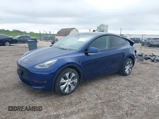 2023 Tesla Model Y Long Range z VIN 7SAYGDEE0PF840787, wystawiony jako IAAI lot #42172489 z przebiegiem 16 314 mil mil oraz . Historia ofert i sprzedaży dostępna na DreamBid. Obrazek 25.