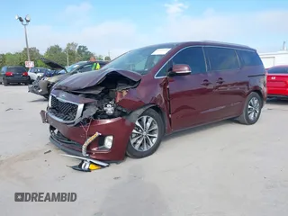 2016 Kia Sedona EX with VIN KNDMC5C1XG6139621, listed as a IAAI auction lot 41545975 with 111,274 mi miles. Bid and sale history available at carsss.com. Image 2.
