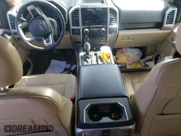 2015 Ford F-150 XLT with VIN 1FTEW1EF2FKE26597, listed as a Copart auction lot 58212385 with 123,756 mi miles and Salvage title. Bid and sale history available at DreamBid. Image 8.