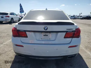 2013 BMW 7 Series 750i with VIN WBAYA8C54DC996412, listed as a Copart auction lot 56982895 with 124,258 mi miles and Salvage title. Bid and sale history available at DreamBid. Image 6.