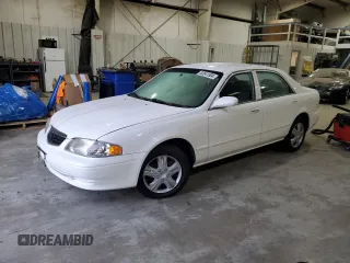 2000 Mazda 626 LX with VIN 1YVGF22D2Y5153254, listed as a Copart auction lot 82841504 with 88,518 mi miles and Clean Title. Bid and sale history available at carsss.com. Image 1.