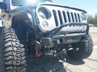 2018 Jeep Wrangler Unlimited Sport with VIN 1C4BJWDG4JL807265, listed as a IAAI auction lot 42520648 with 69,229 mi miles and . Bid and sale history available at DreamBid. Image 12.
